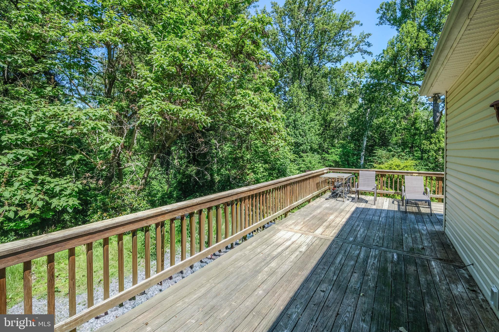 1195 Shangri-La Road Bentonville, VA 22610 - Photo 14 of 64 a view of balcony with wooden floor and fence