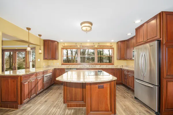 a view of a kitchen with a sink cabinets and a kitchen