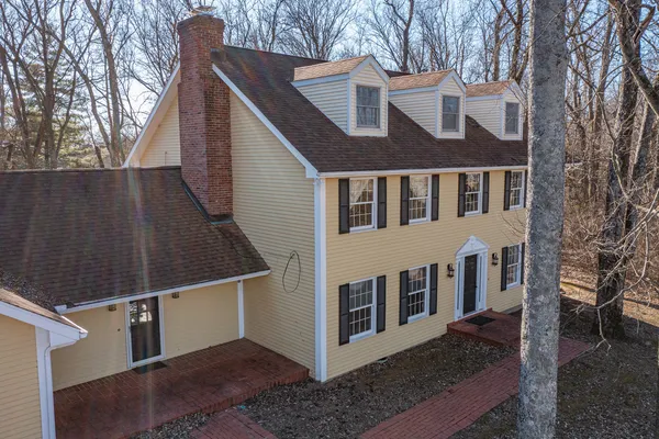 a view of garage with tree