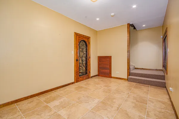 a view of entryway with stairs