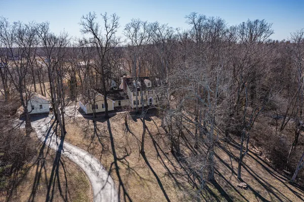a view of a house with backyard wooden floor and fence