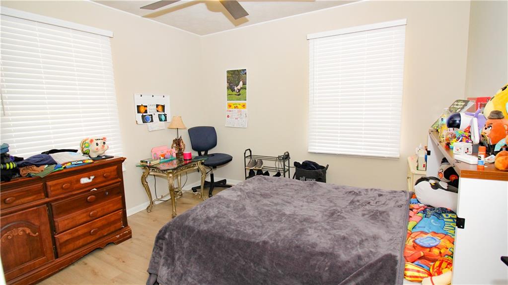 5207 White Boulevard Southwest Mableton, GA 30126 - Photo 19 of 30 a bedroom with a bed and a window