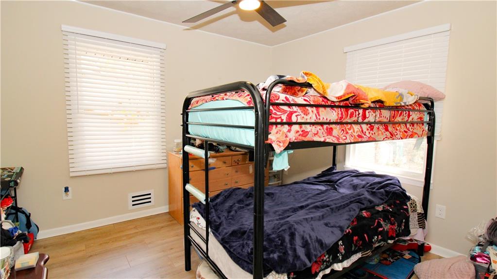 5207 White Boulevard Southwest Mableton, GA 30126 - Photo 20 of 30 a bed room with a bed and a window