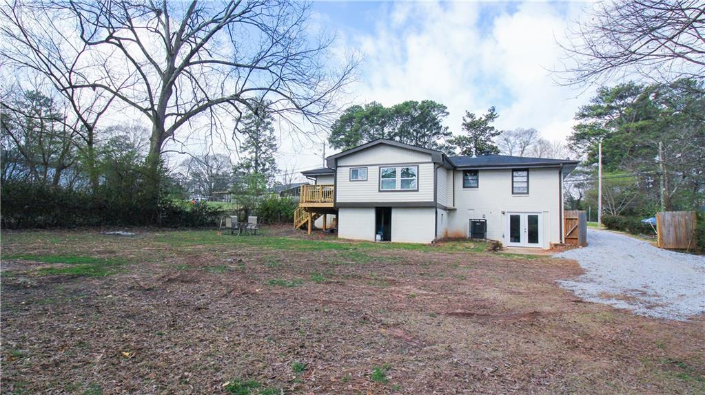 5207 White Boulevard Southwest Mableton, GA 30126 - Photo 30 of 30 a view of a house with a yard and large trees