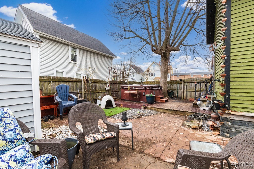 30 School Street Lancaster, NY 14086 - Photo 44 of 50 Stamped concrete patio with shed for exterior stor
