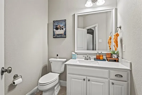 a dining room with furniture a window and wooden floor