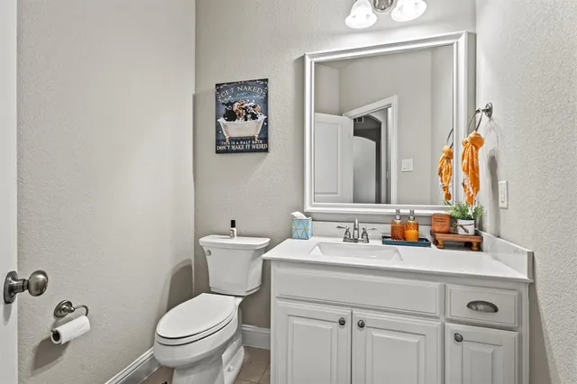 a dining room with furniture a window and wooden floor