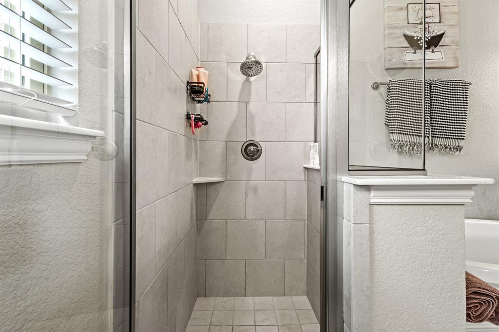 3406 Woodford Drive Mansfield, TX 76084 - Photo 22 of 29 a bathroom with a shower