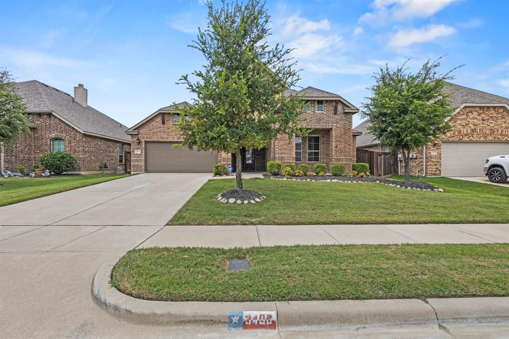 3406 Woodford Drive Mansfield, TX 76084 - Photo 29 of 29 front view of a house with a yard