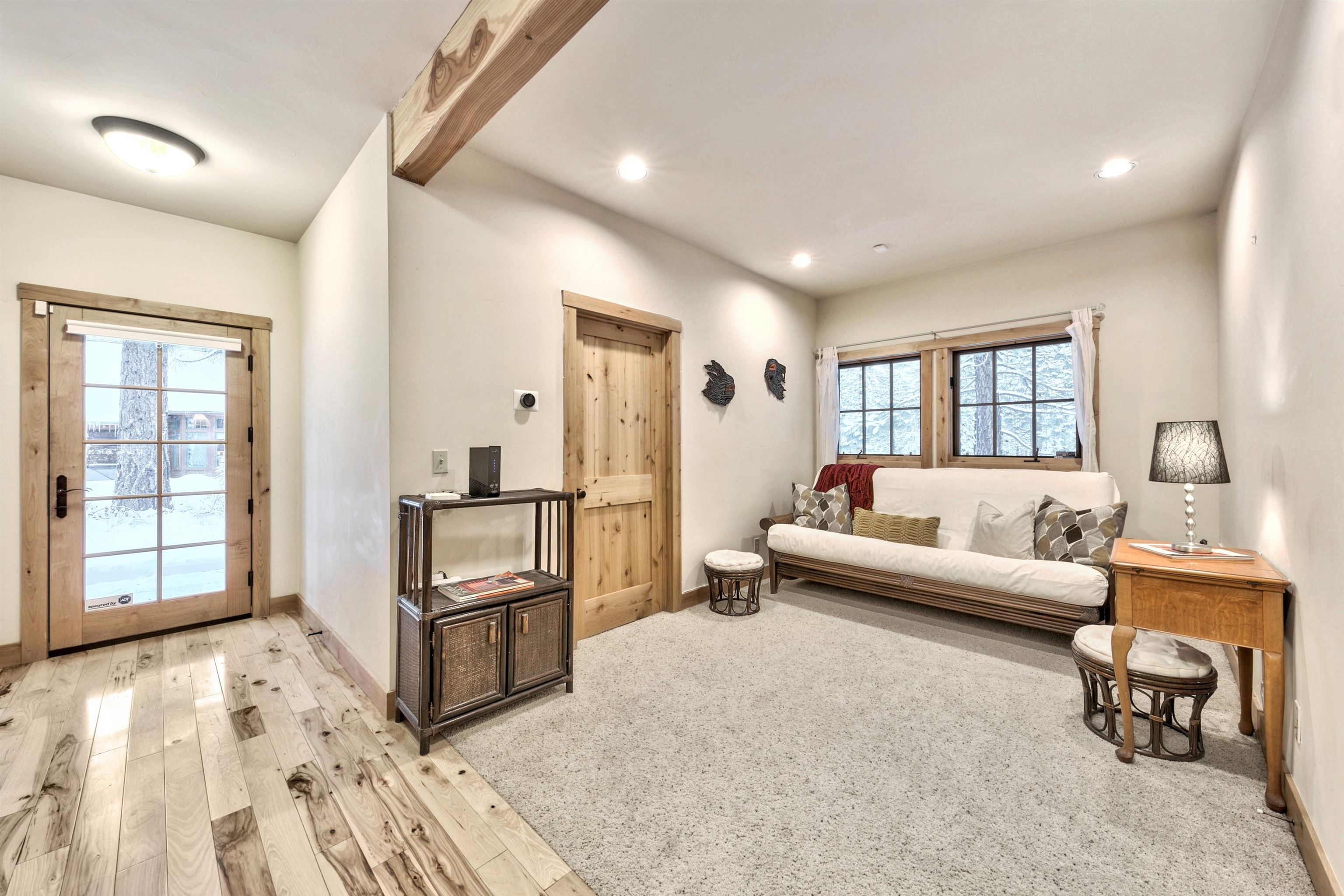 11262 Comstock Drive Truckee, CA 96161 - Photo 13 of 21 a living room with furniture and a flat screen tv