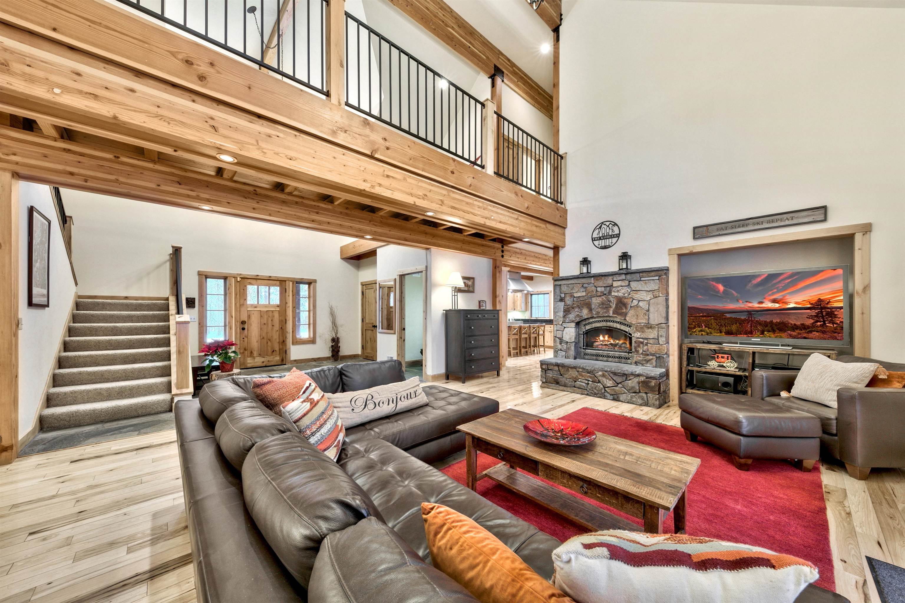 11262 Comstock Drive Truckee, CA 96161 - Photo 8 of 21 a living room with furniture and a flat screen tv