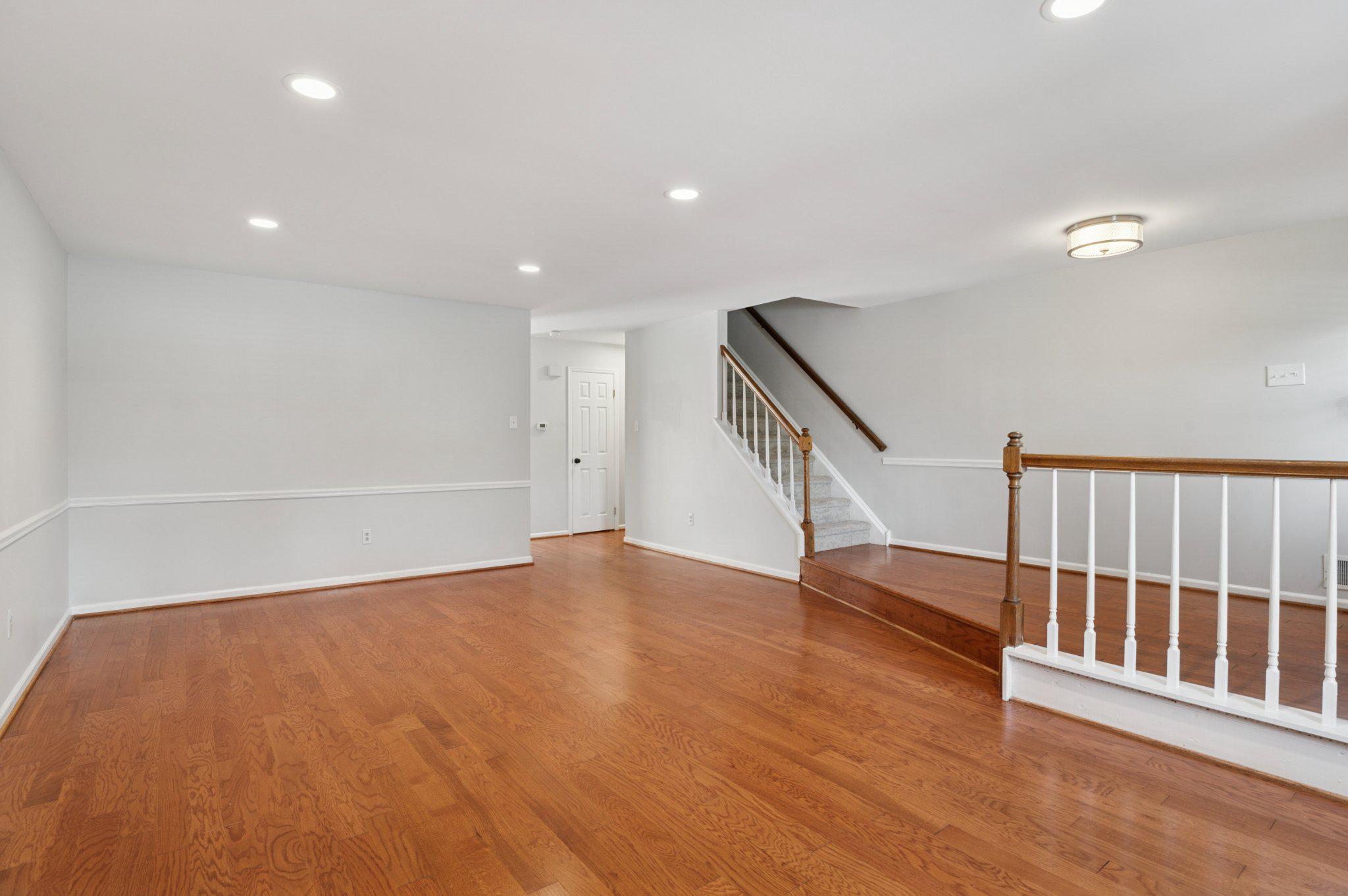 237 McIntosh Road, Unit 82 West Chester, PA 19382 - Photo 3 of 18 a view of an empty room with wooden floor