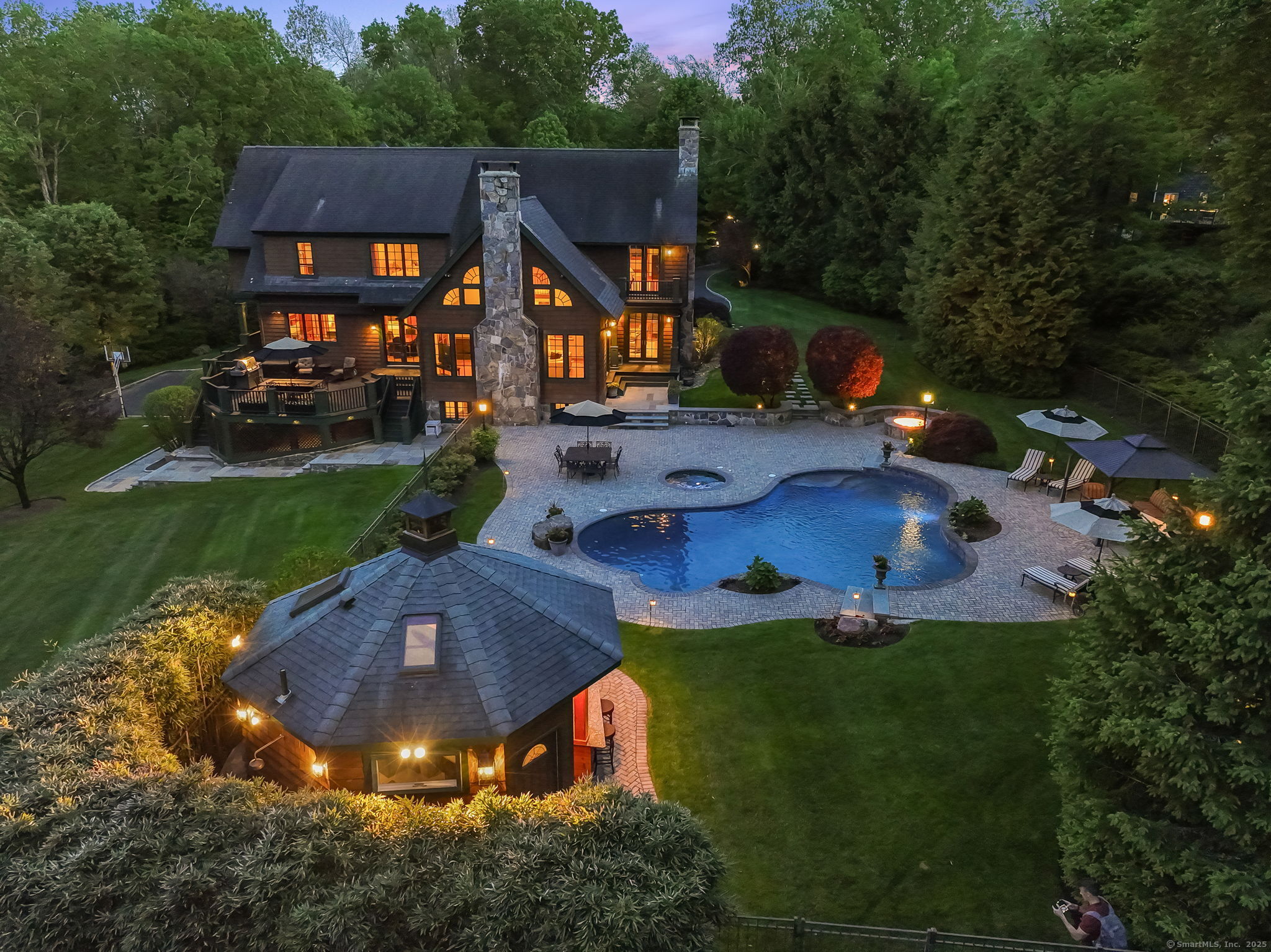 17 Fire Hill Lane Redding, CT 06896 - Photo 1 of 1 Twilight elegance - where refined outdoor living meets evening ambiance.