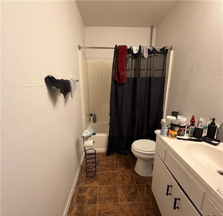 1567 Ellen Court Merced, CA 95341 - Photo 7 of 16 a bathroom with a sink toilet and shower