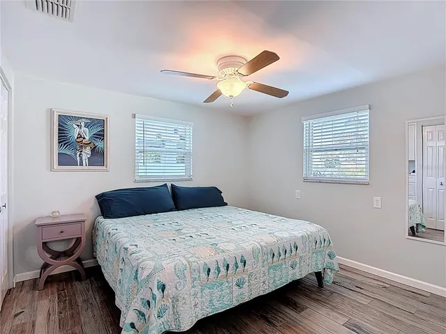 a view of a chairs and table in a patio