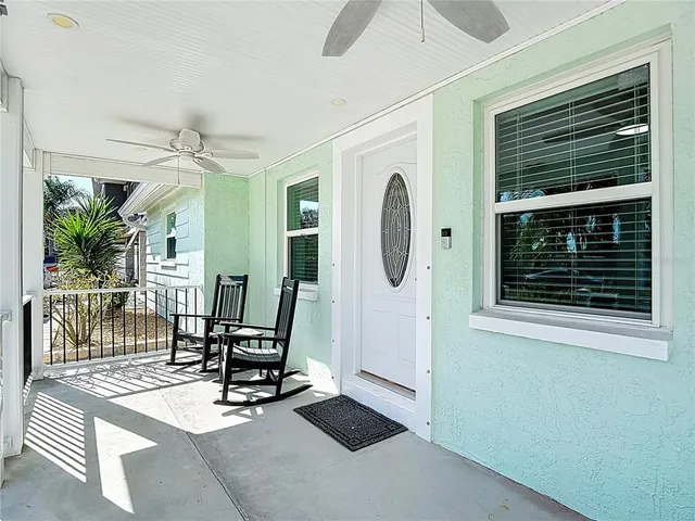 a view of a livingroom with furniture and a window