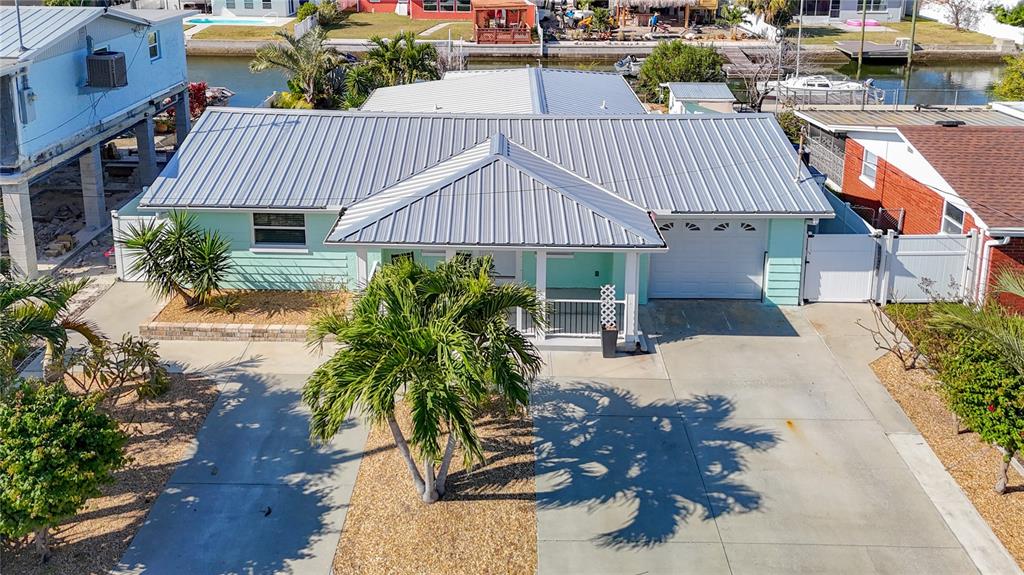 13607 Frances Avenue Hudson, FL 34667 - Photo 66 of 76 a view of a house with backyard and sitting area