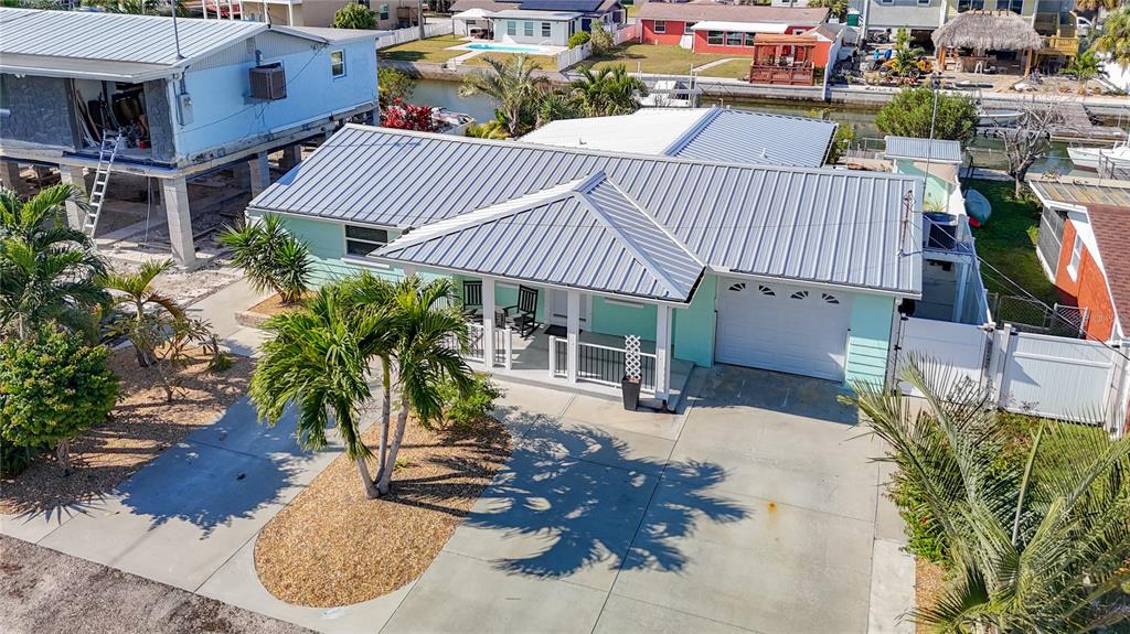13607 Frances Avenue Hudson, FL 34667 - Photo 67 of 76 a view of a house with a patio