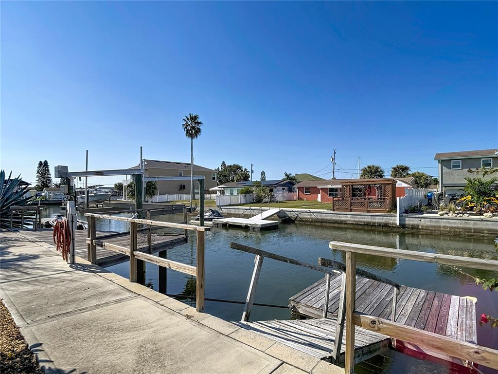 13607 Frances Avenue Hudson, FL 34667 - Photo 71 of 76 a view of a chairs and table on the terrace