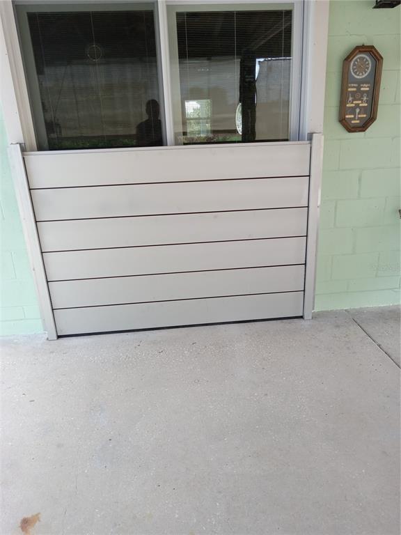 13607 Frances Avenue Hudson, FL 34667 - Photo 76 of 76 a view of front door of a house