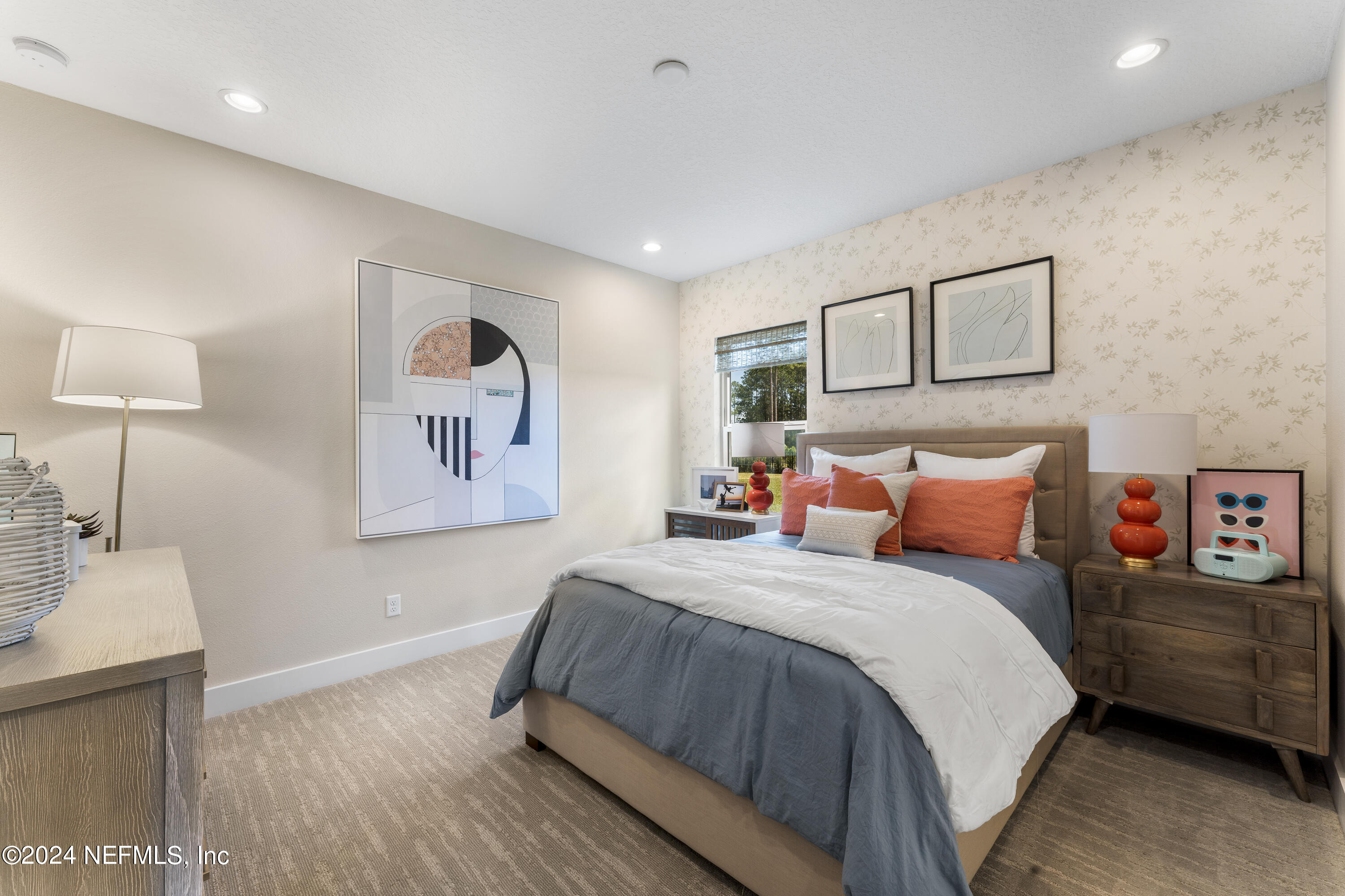 34 Natureland Circle St. Augustine, FL 32092 - Photo 20 of 26 a bedroom with a bed and a lamp