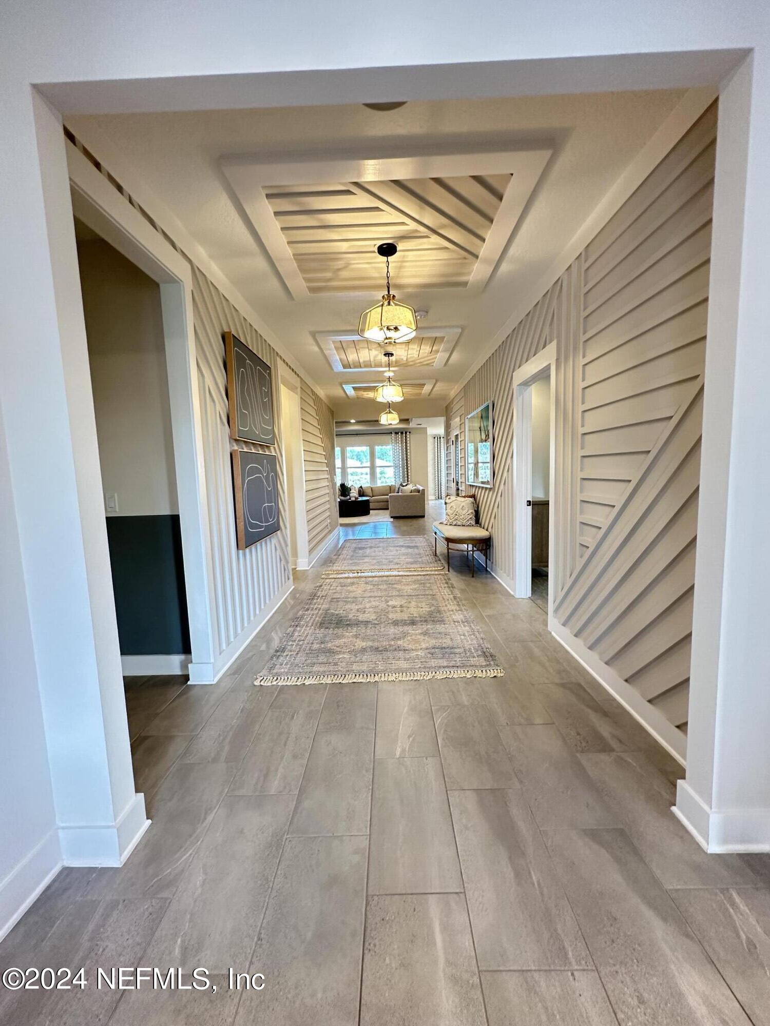 34 Natureland Circle St. Augustine, FL 32092 - Photo 4 of 26 a view of a hallway with a window