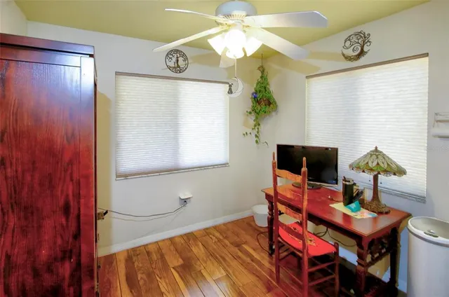 a workspace with furniture and window