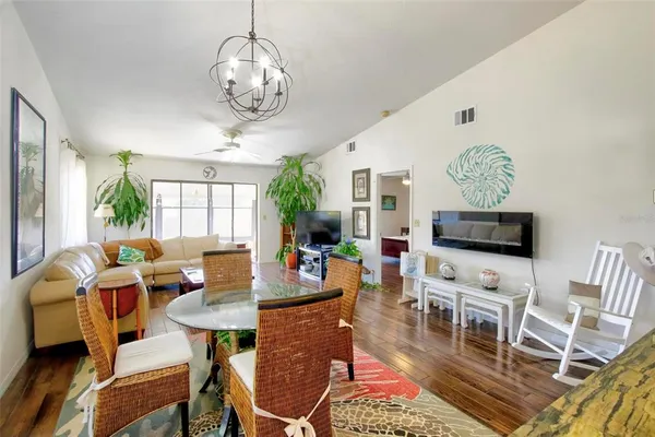 a view of a dining room with furniture