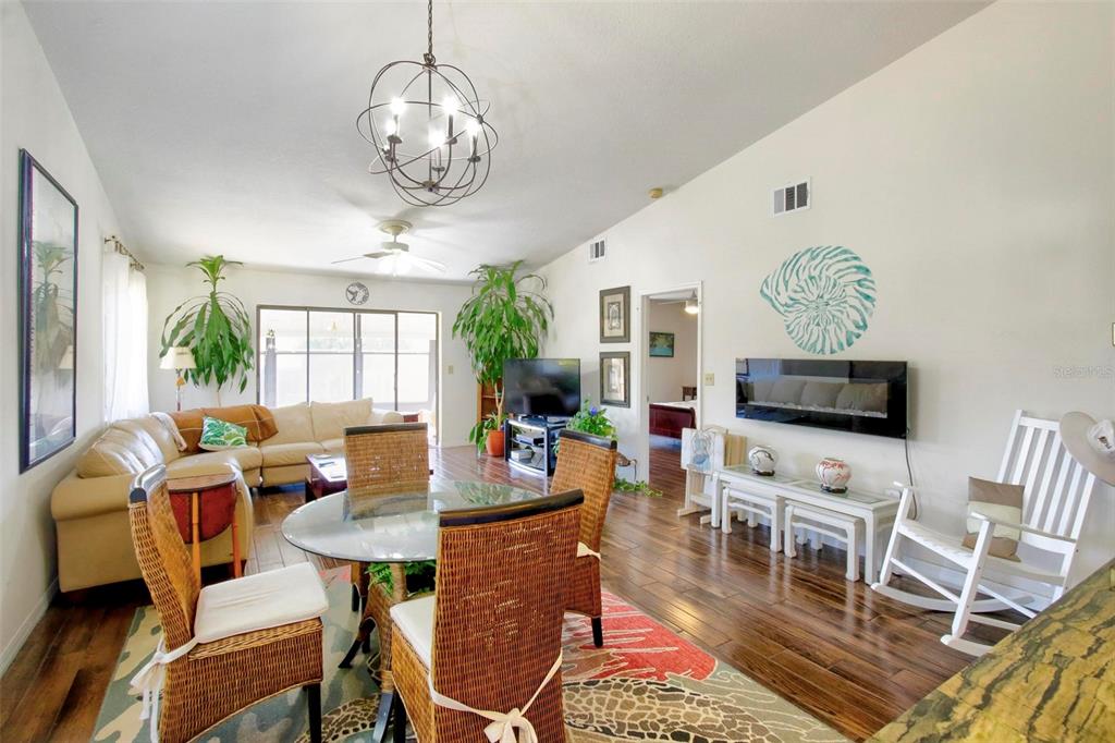 6502 River Run Boulevard, Unit 6502 Weeki Wachee, FL 34607 - Photo 18 of 47 a view of a dining room with furniture