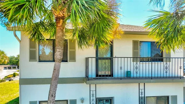 a view of a house with a swimming pool
