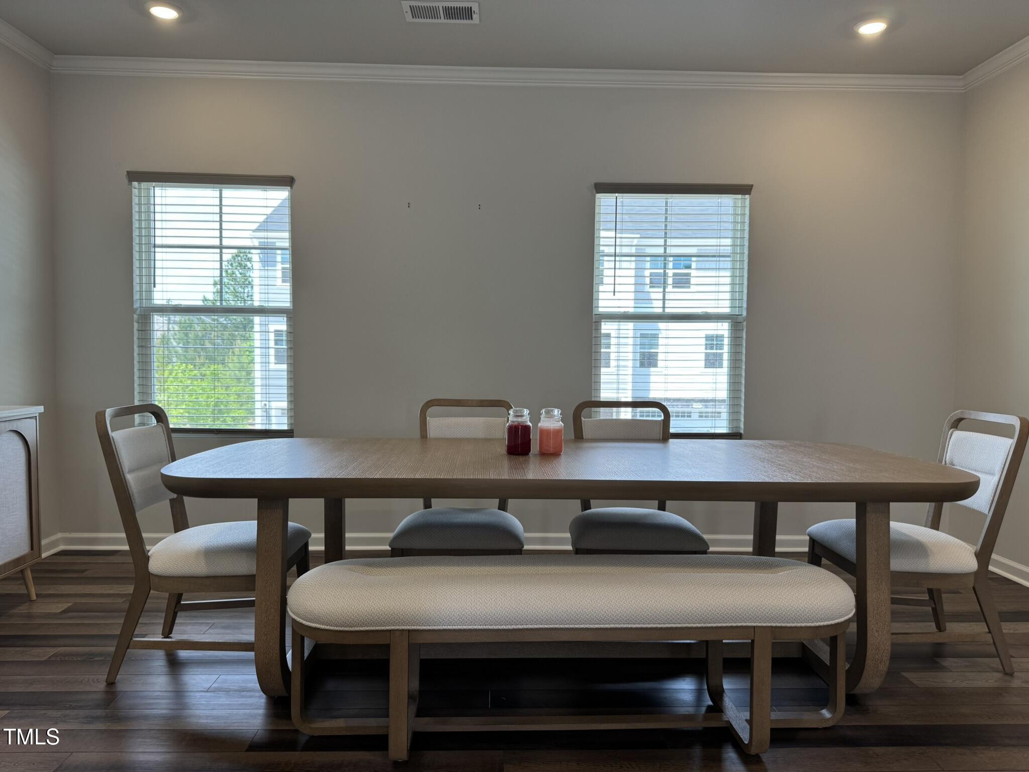 1106 Crossvine Trail Durham, NC 27703 - Photo 14 of 35 a view of a dining room with furniture and wooden floor