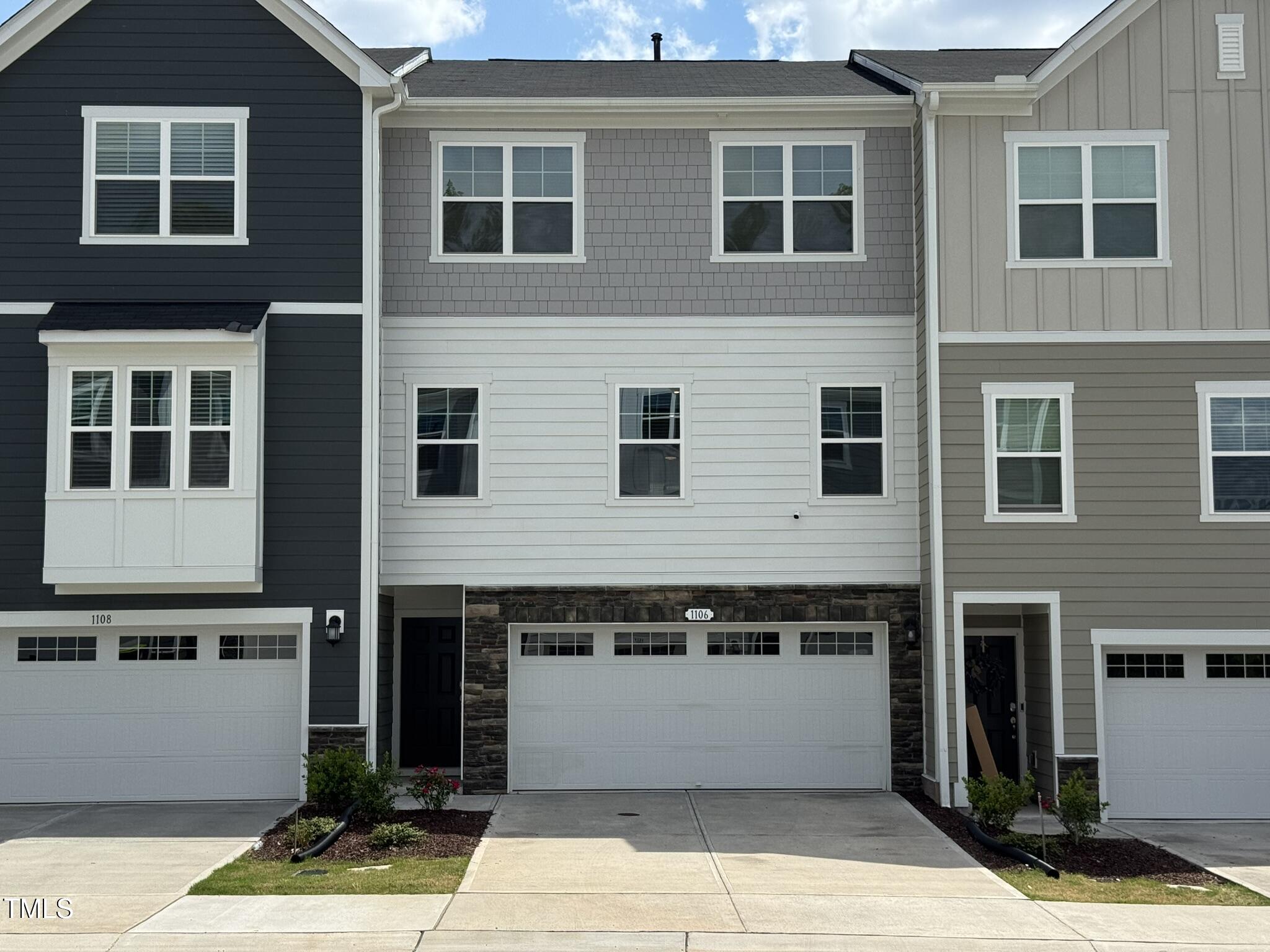 1106 Crossvine Trail Durham, NC 27703 - Photo 2 of 35 a front view of a building with windows