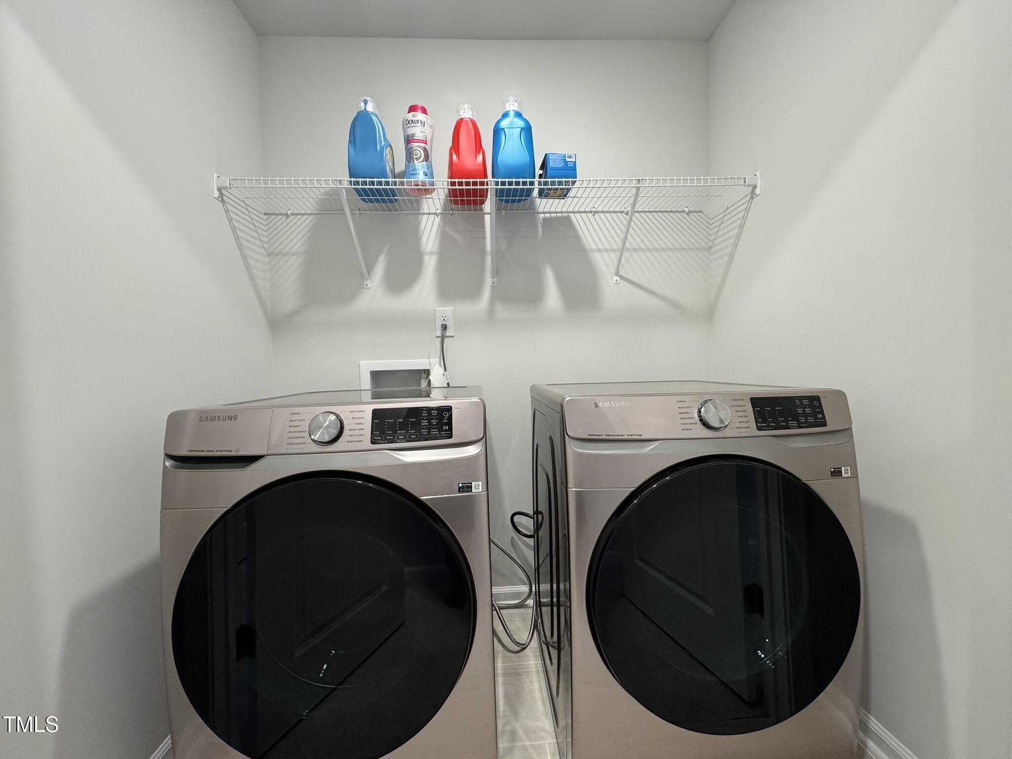 1106 Crossvine Trail Durham, NC 27703 - Photo 31 of 35 a close view of utility room with washer and dryer