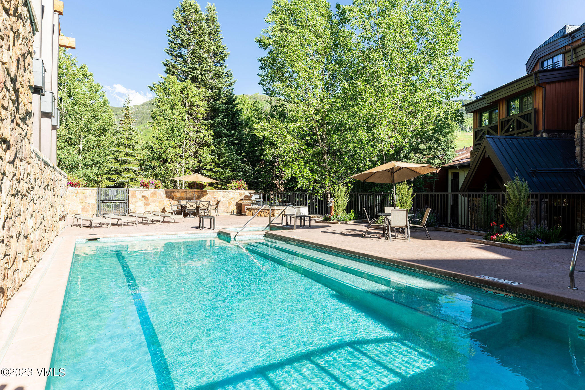 434 South Frontage Road East, Unit 202 Vail, CO 81657 - Photo 21 of 25 vail_mtn_view_202_exterior_pool