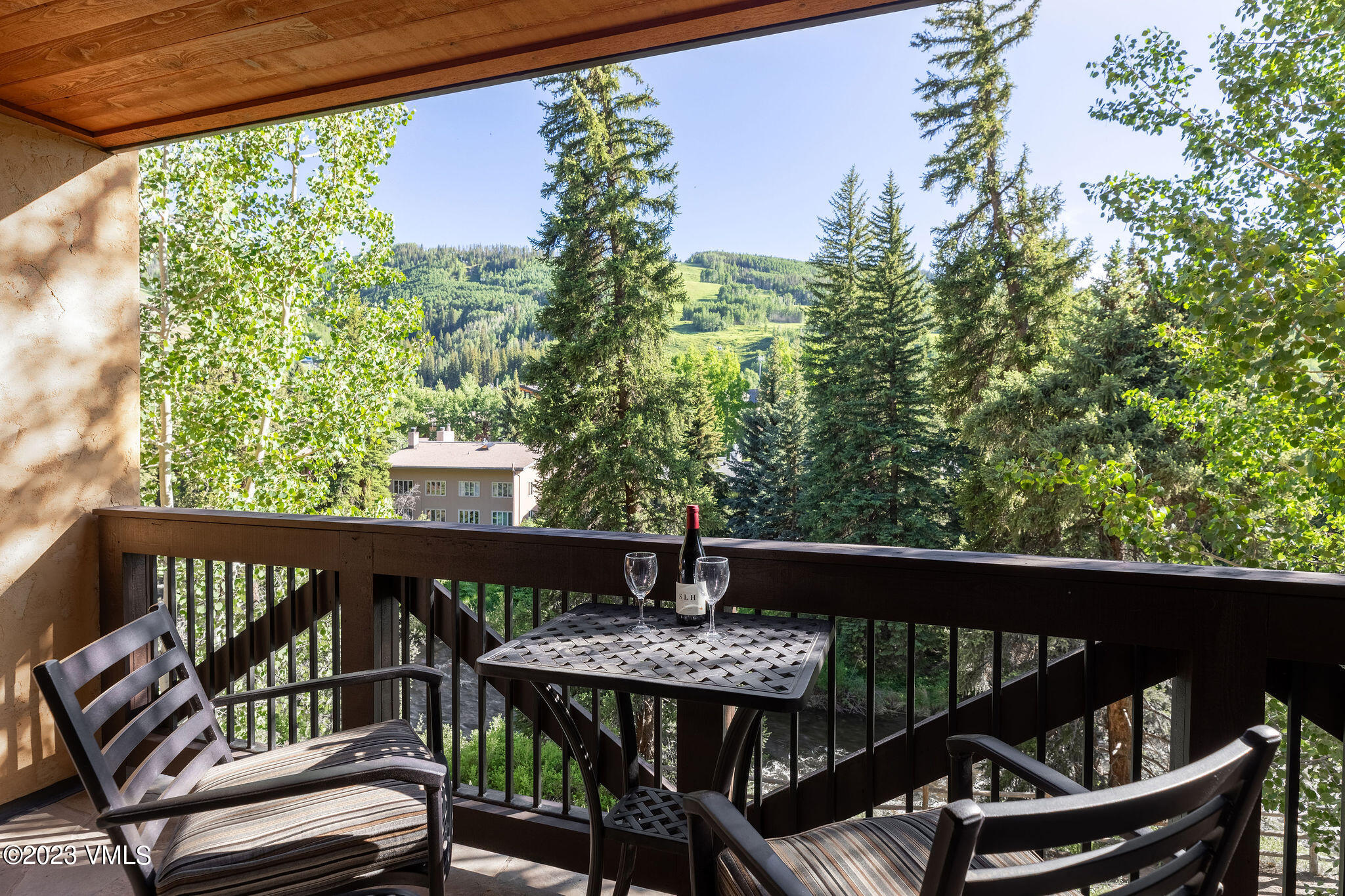 434 South Frontage Road East, Unit 202 Vail, CO 81657 - Photo 9 of 25 vail_mtn_view_202_exterior_deck_b