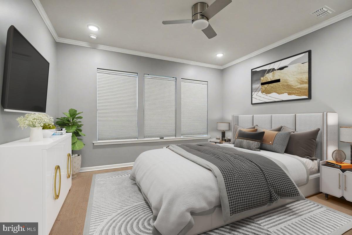 1165 Mason Road Hatfield, PA 19440 - Photo 14 of 33 a bedroom with a large bed and a flat screen tv