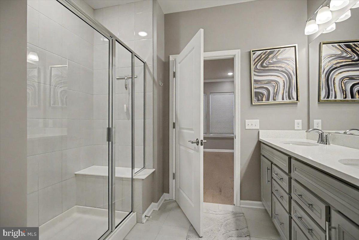 1165 Mason Road Hatfield, PA 19440 - Photo 18 of 33 a bathroom with a shower sink vanity and mirror
