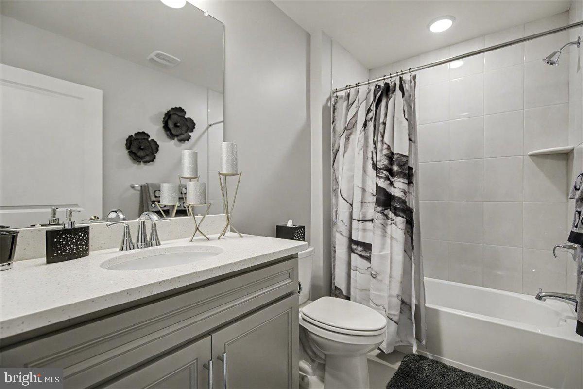 1165 Mason Road Hatfield, PA 19440 - Photo 24 of 33 a bathroom with a sink a toilet and shower