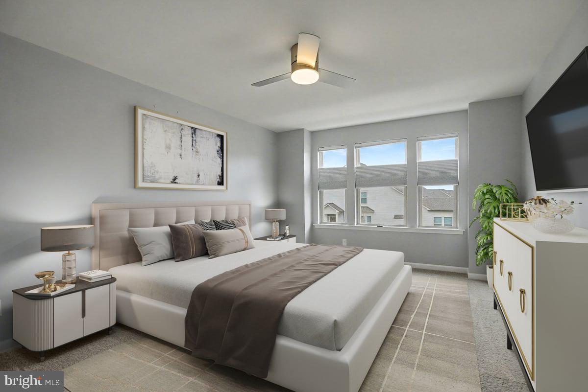 1165 Mason Road Hatfield, PA 19440 - Photo 25 of 33 a bedroom with a bed and a flat screen tv