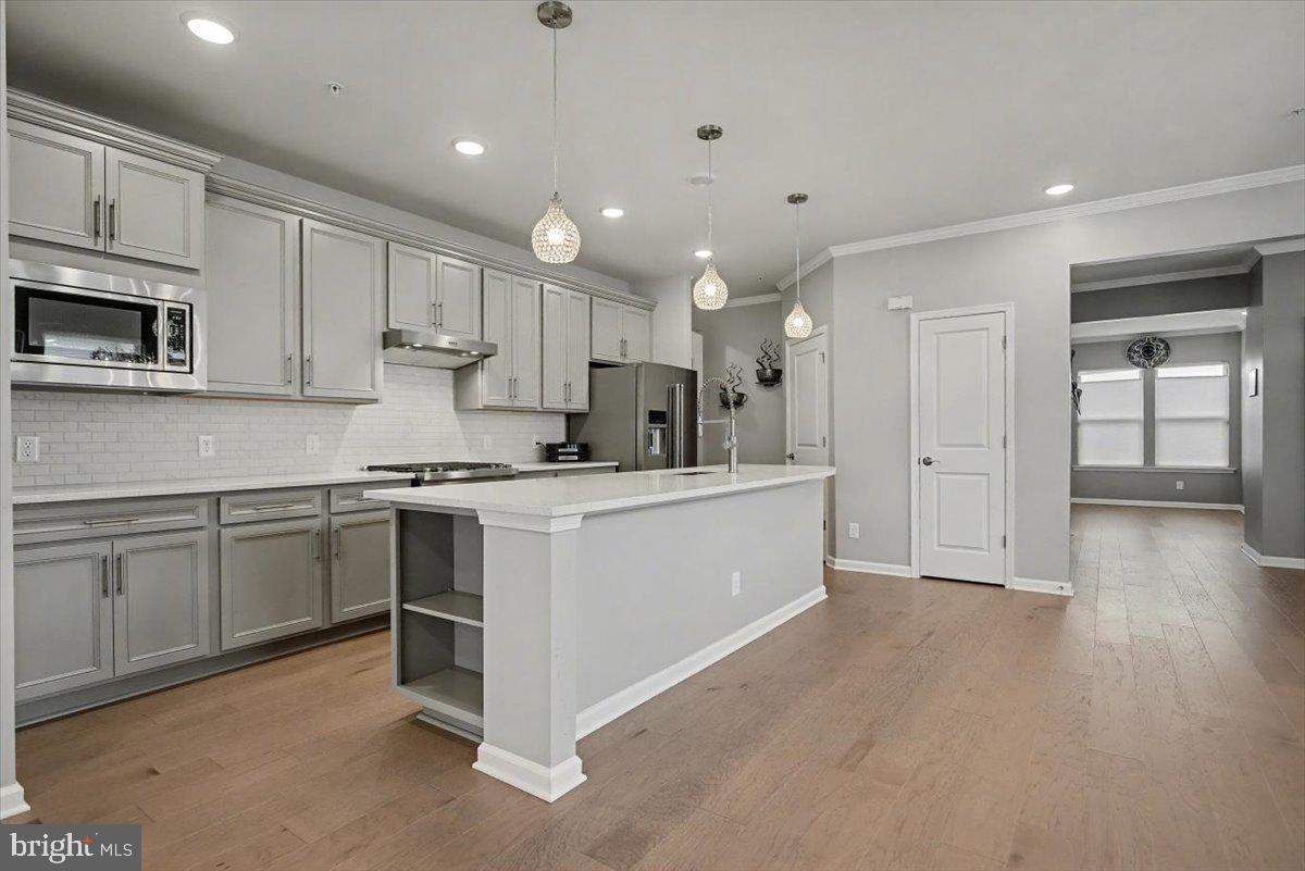 1165 Mason Road Hatfield, PA 19440 - Photo 9 of 33 a kitchen with cabinets and stainless steel appliances