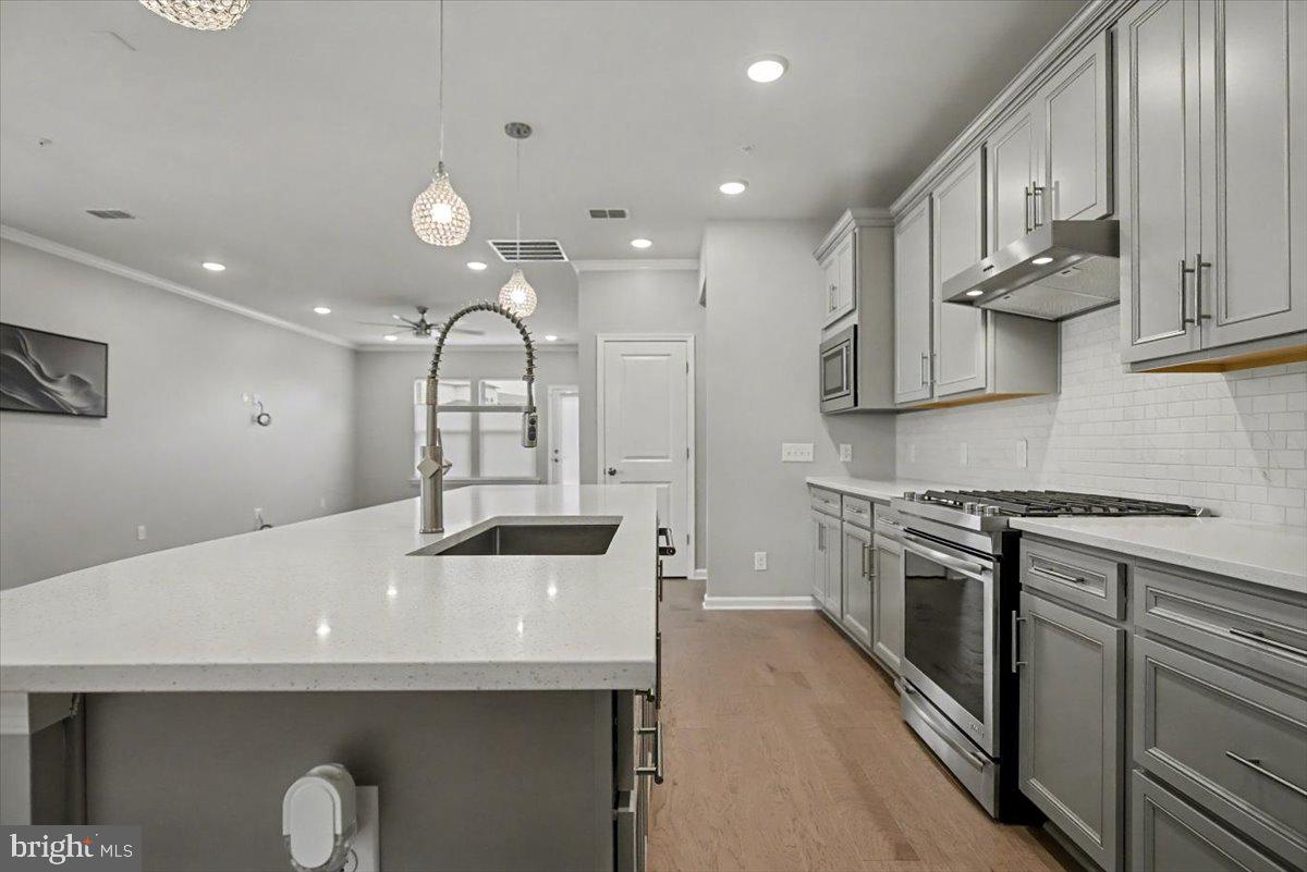 1165 Mason Road Hatfield, PA 19440 - Photo 10 of 33 a kitchen with stainless steel appliances granite countertop a sink and a stove
