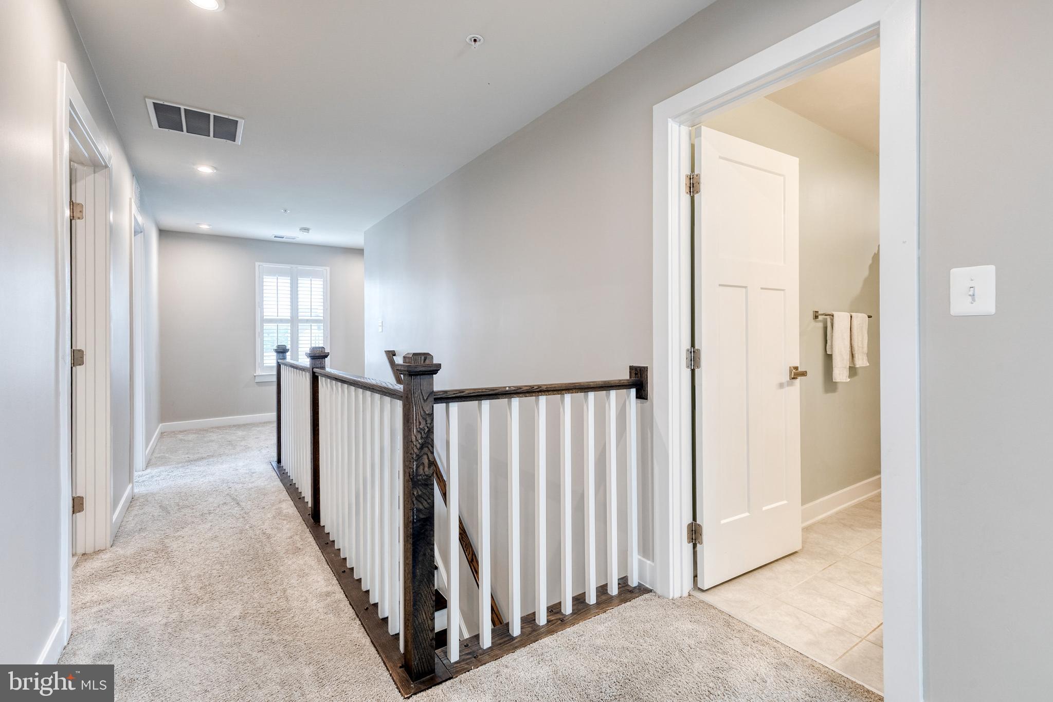 6003 Valentine Way Hanover, MD 21076 - Photo 45 of 52 a view of a hallway with a furniture