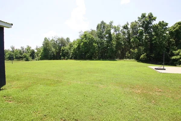 a view of an outdoor space and a yard