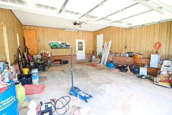 a view of a livingroom with furniture and a window