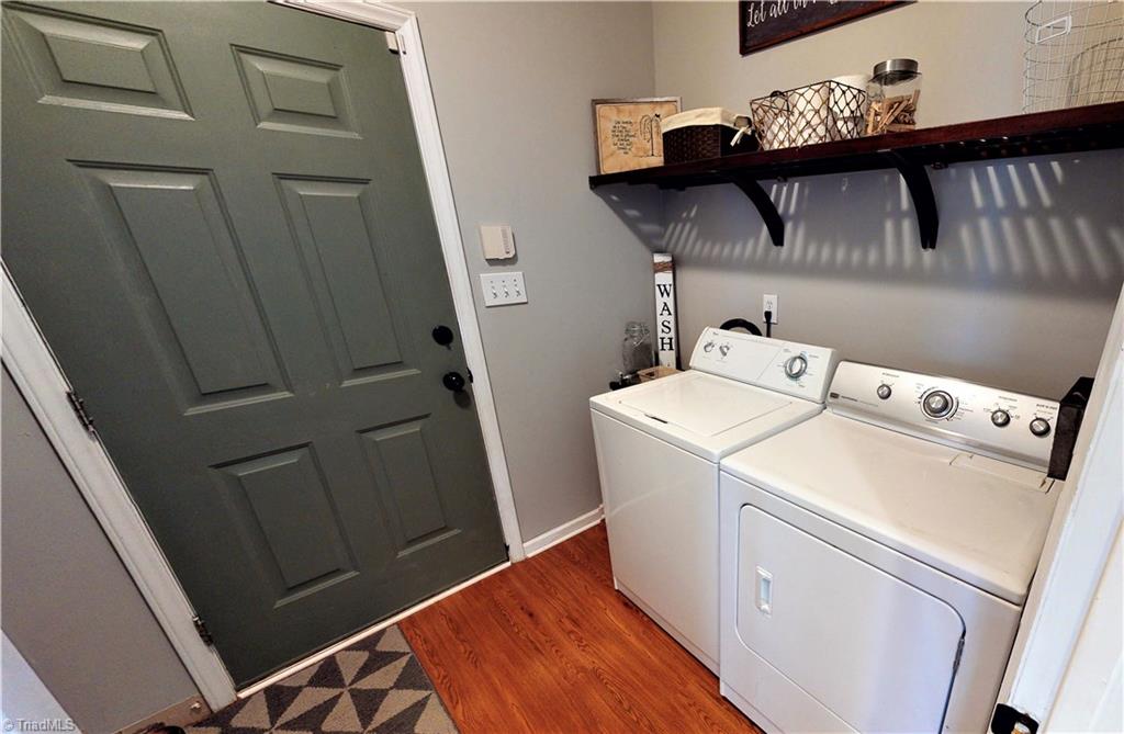 4129 Carroll Ridge Court High Point, NC 27265 - Photo 16 of 30 Laundry/mud room/command center area. Direct access from garage or hall, built in shelving, plenty of storage options for laundry, bags, shoes, etc.