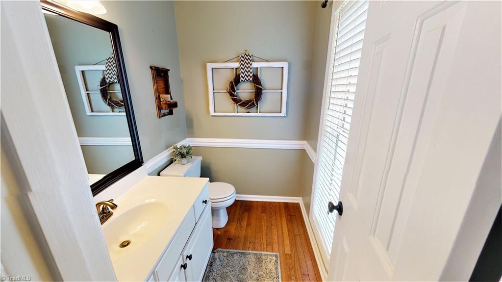 4129 Carroll Ridge Court High Point, NC 27265 - Photo 18 of 30 1/2 bath is conveniently and privately located off foyer, not beside living areas.