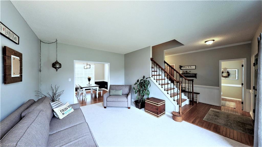 4129 Carroll Ridge Court High Point, NC 27265 - Photo 5 of 30 Foyer is open to living room which creates nice flow from room to room.