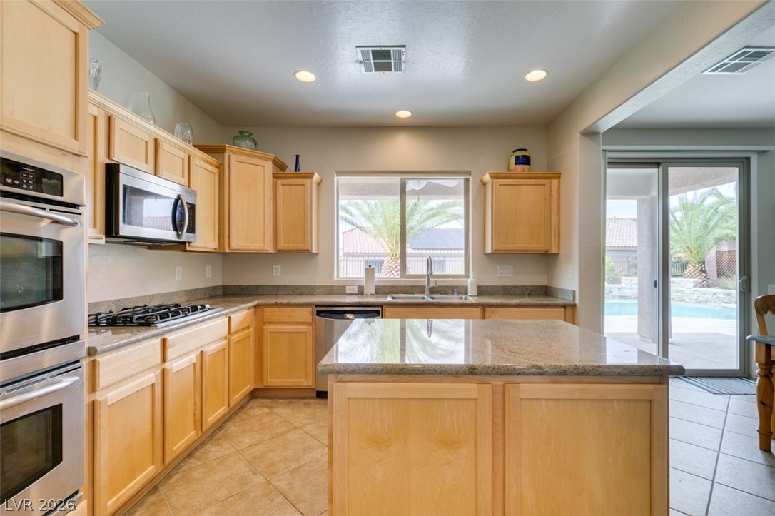 2540 Calanques Terrace Henderson, NV 89044 - Photo 5 of 47 Double ovens, island, walk-in pantry
