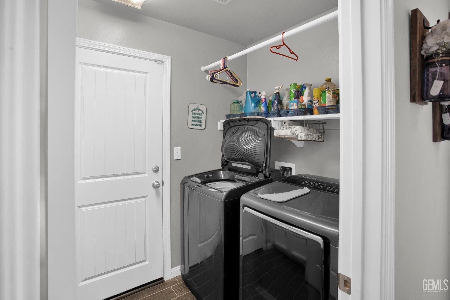Undisclosed Address Bakersfield, CA 93311 - Photo 13 of 22 a utility room with dryer and washer