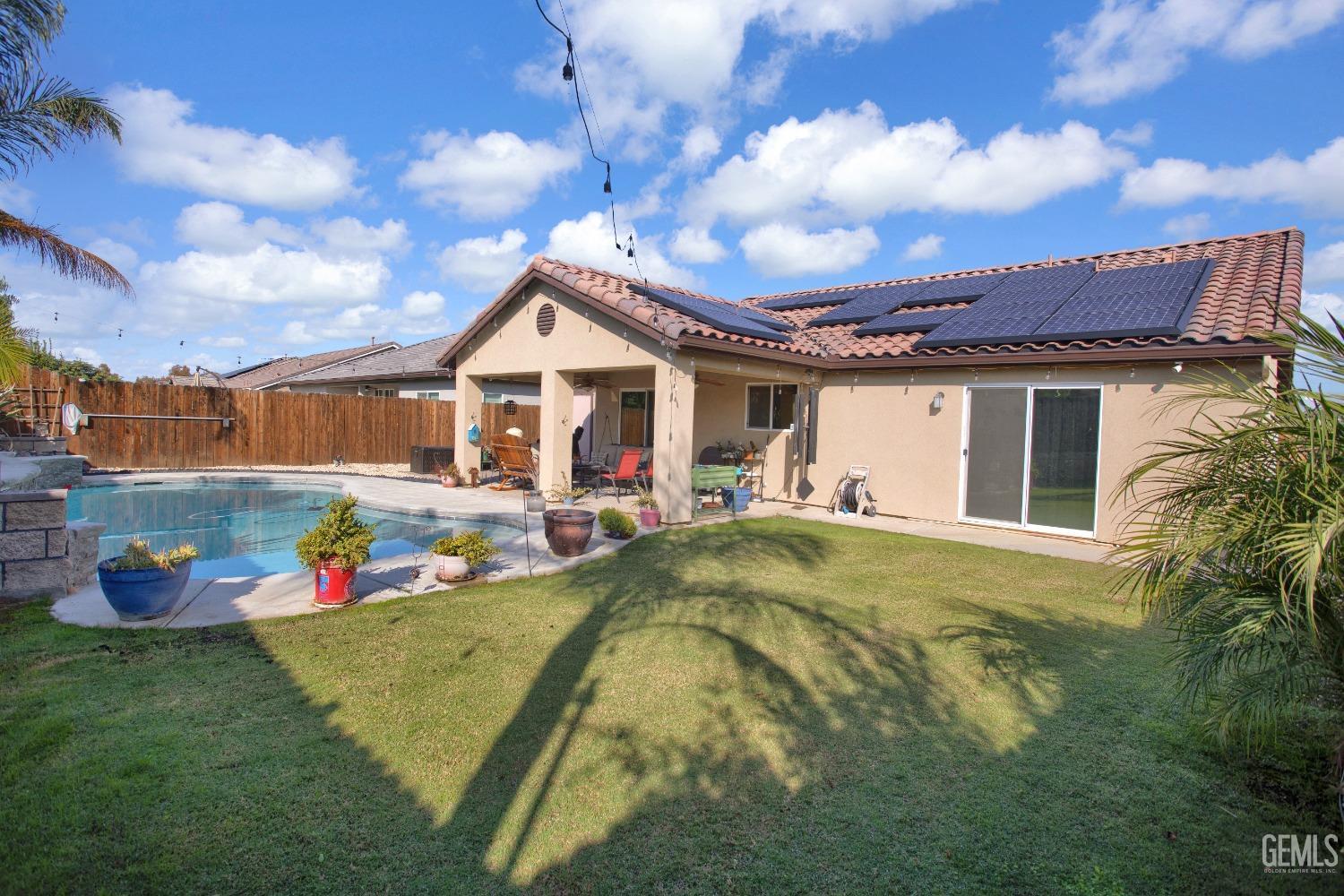 Undisclosed Address Bakersfield, CA 93311 - Photo 22 of 22 a view of swimming pool with an outdoor seating